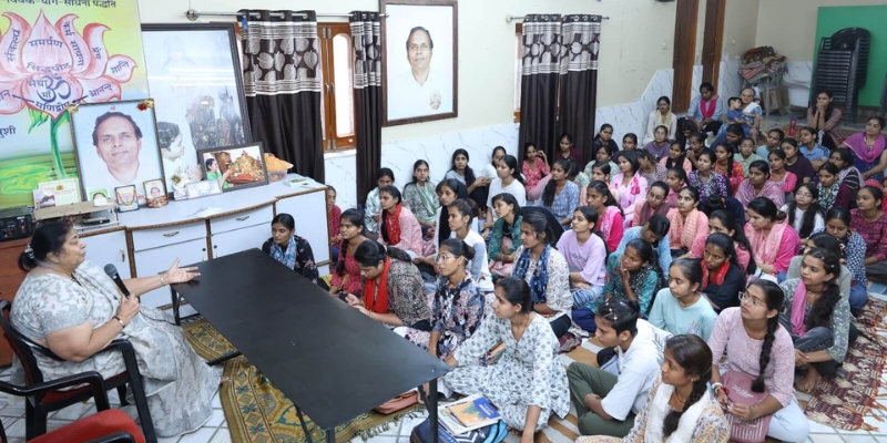 Girls listening to Bhaiyaji's encouraging speech at Manidweep